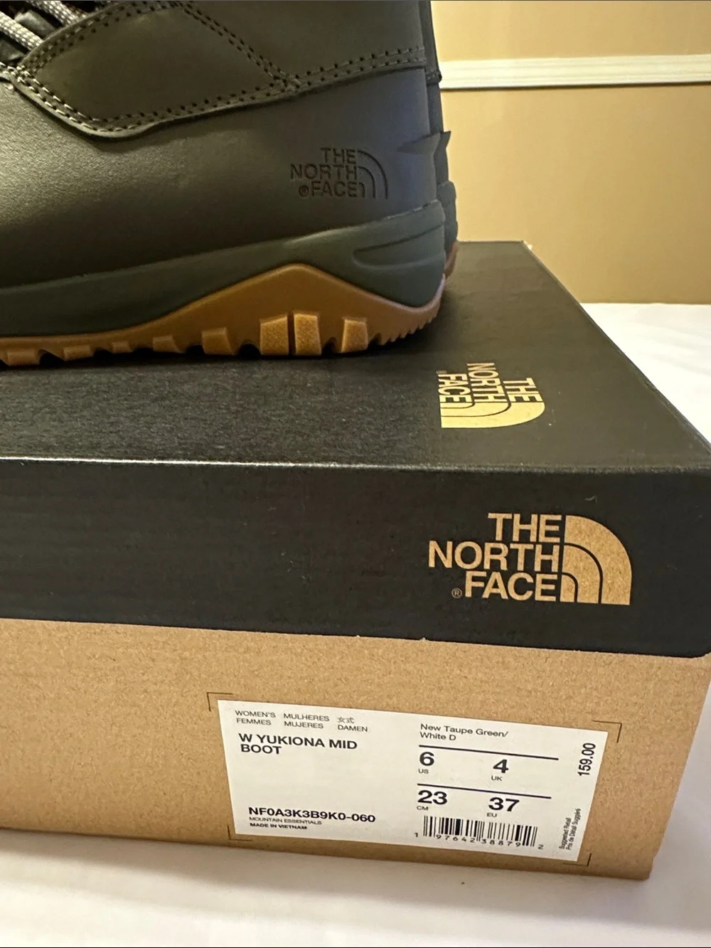 The North Face Women's Taupe/Green Insulated Winter Boots with Tan Outsoles .
